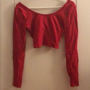 Long sleeve red crop top with elbow cut puts